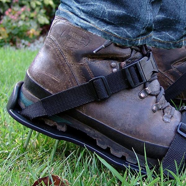 Men wearing the MOOWY Lawn Aerator Shoes for aerating the lawn - product image 1