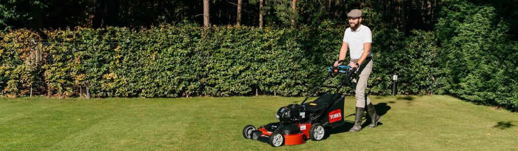 Louis from MOOWY mowing his lawn