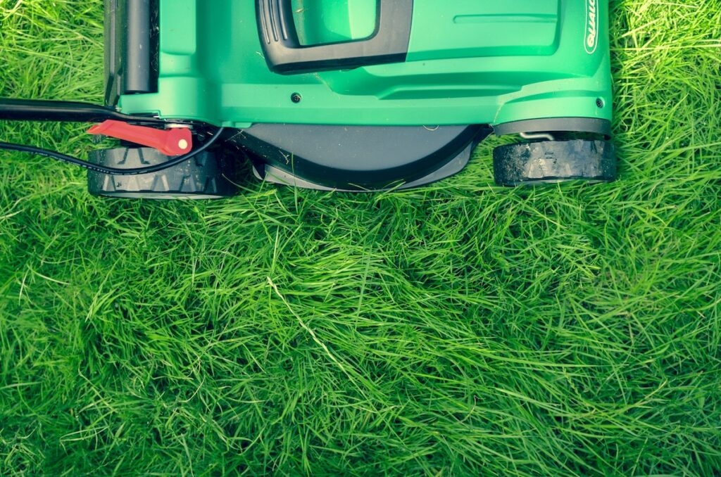 Mower on long grass