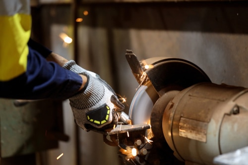 A bench grinder in action